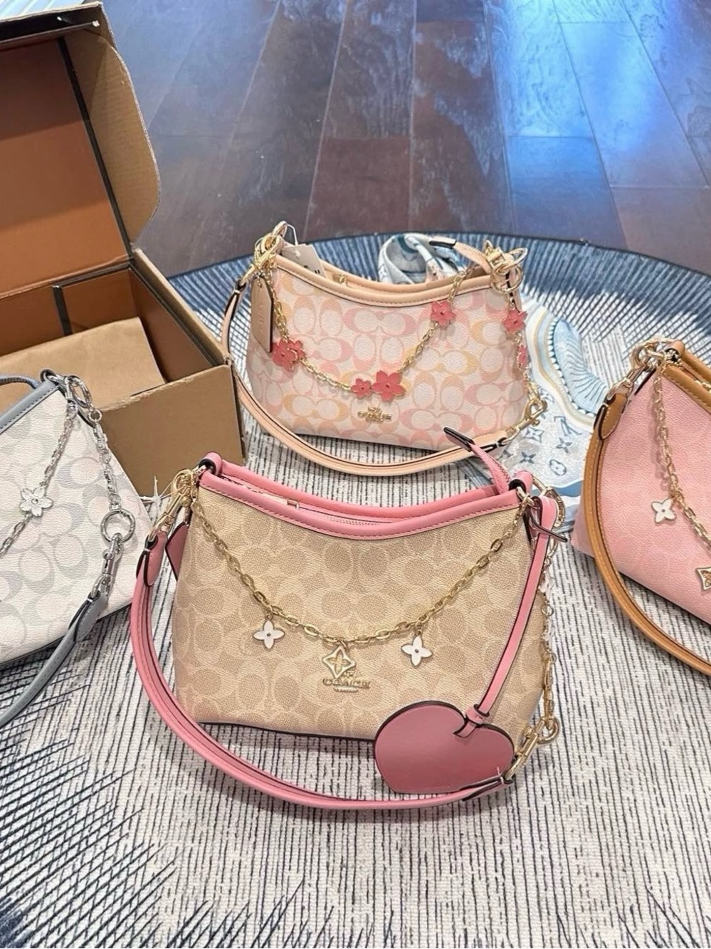 Coach Beige Signature Canvas Shoulder Bag with Pink Trim and Heart Charm